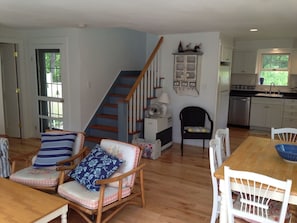 view of back door to fenced in backyard