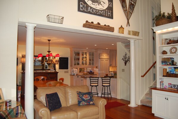 Open floor plan on the main living area; family/TV room, dining area and kitchen