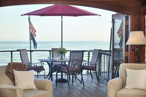 Dine al fresco to the tune of waves crashing below!