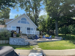 New patio with built in fire pit and knee walls for additional seating