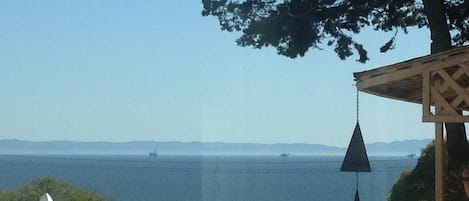 View from living room, kitchen and dining area. Nice Ocean Breeze.  