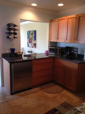 Kitchenette with mini-fridge, ice maker, coffee maker and microwave
