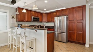 Updated kitchen with stainless appliances and granite counter tops