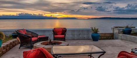 Beach Patio: Take in slowly changing sunsets mingled with burning fire & waves