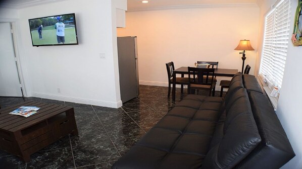 Have a seat on this comfortable European sofa as your entertained. 