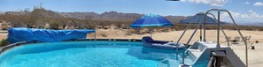 Breathtaking views from a tranquil pool oasis, on the Park boundary