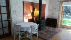 Bistro table and Jotul gas stove