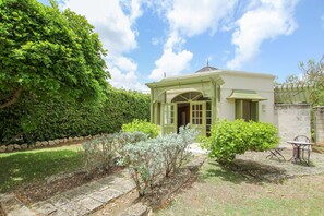 The cottage is surrounded by greenery and feels totally private