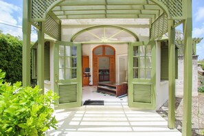 Swing the french doors wide open or close them and pull the curtains for more privacy