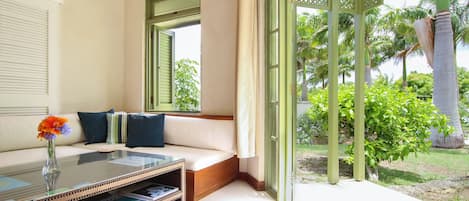 The bright and airy living area looks out onto the garden