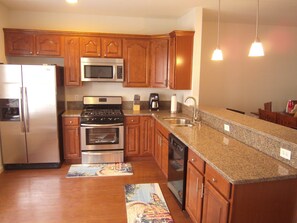 Fully equipped Designer kitchen.  Granite countertop.