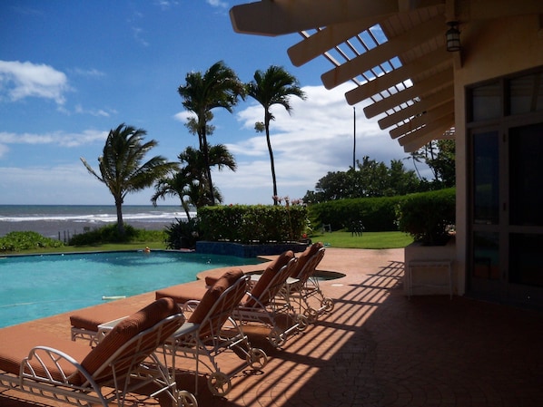 lounge poolside and enjoy the ocean views