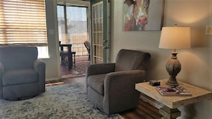 Living room looking toward the back porch.