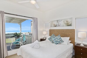 Master bedroom ocean views, ensuite and queen bed.