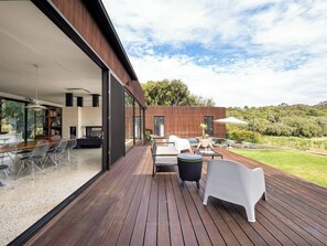  Unwind with a glass of local wine on the deck while watching the sun set over the vines.