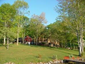 Gentle slope from the lake to the house