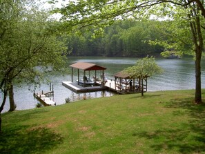 Large Dock with covered area and 32ft floater where you can tie up a rental boat