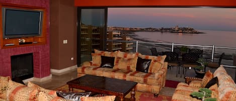 Relax in the Great Room and enjoy an Evening View of The Old Port at Sunset