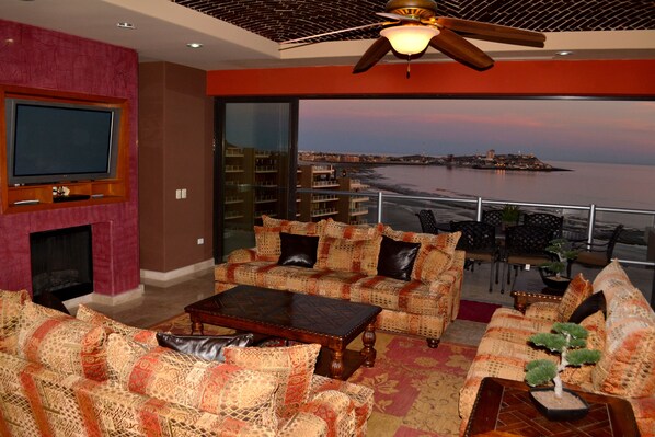 Relax in the Great Room and enjoy an Evening View of The Old Port at Sunset