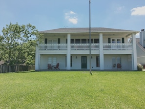 Back of the home that faces the bay