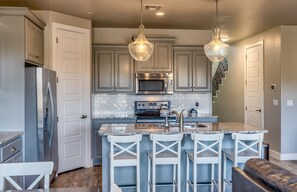 Kitchen Island - The Kitchen Island comfortably seats 4 adults and creates a great space for serving and preparing meals.