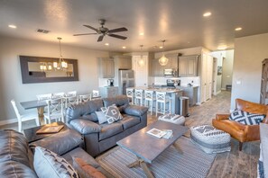 Living Room - The Living Room is conveniently located adjacent to the Kitchen and Dining Table and is a great place for entertaining guests during downtime