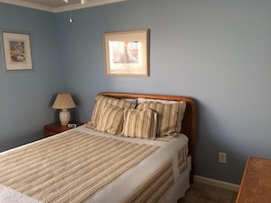 Master bedroom with queen bed.