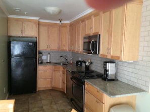 Kitchen.  All appliances, coffee maker, blender, toaster, dishes, etc..