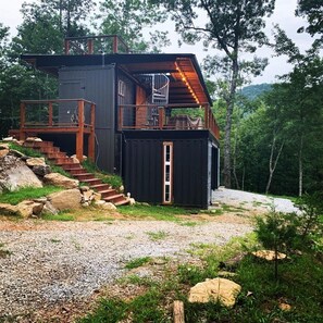 The side view of the cabin shows off the new sloped roof that'll keep you dry wh