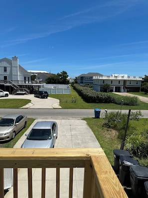 View East from 2nd floor deck , path to beach, house & tree in middle oceanfront