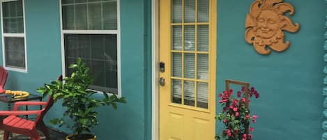 The front door of the "Longhouse" cottage overlooking the garden area