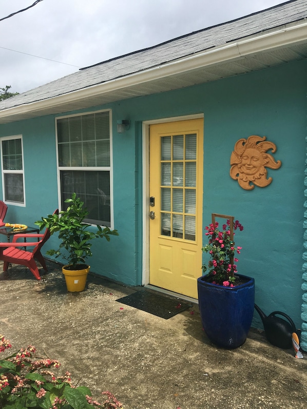 The front door of the "Longhouse" cottage overlooking the garden area