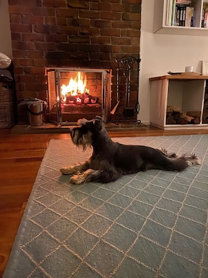 In cooler months enjoy our original open fireplace