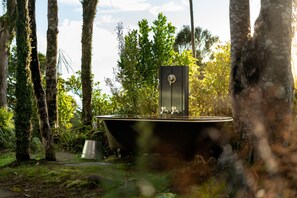 Bath nestled in the forest