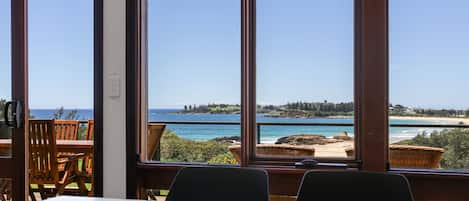 Beach and ocean views from living and dinning room. 