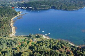 A lovely aerial view of the cove. The cottage sits at the head of the cove . 