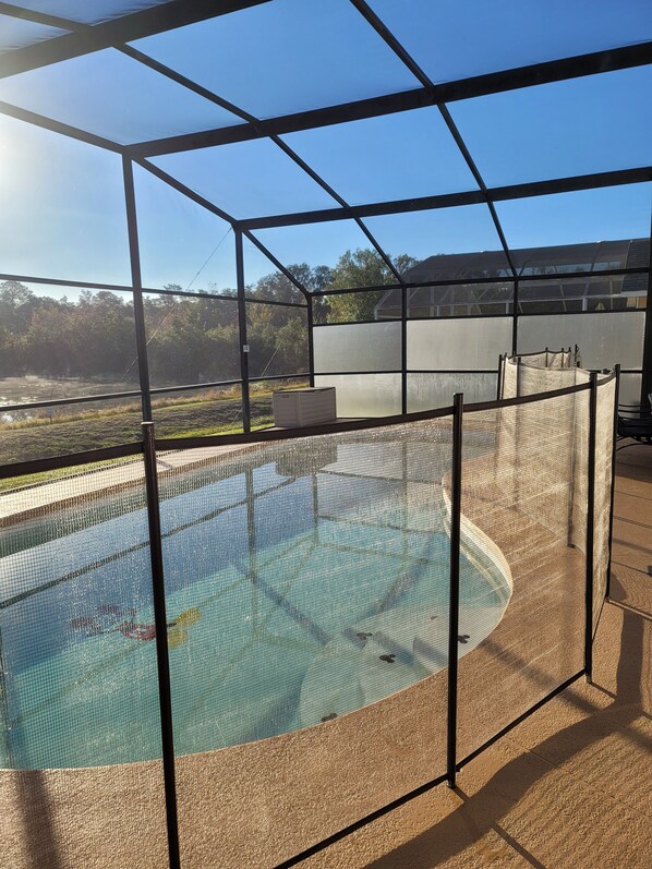 Mickey Mouse pool with fence that you can add if you have young kids