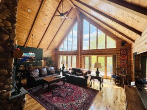 Living room and dining area with views of Ascutney Mountain