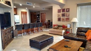 Living room and kitchen bar. 