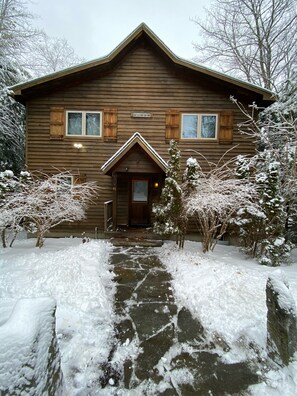 Front of house from the street.  The back of the house has the views of the Lake