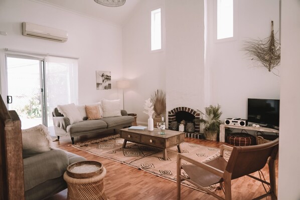 Serene, sunlit living space designed for pure relaxation. 