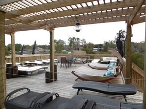 Expanded new deck area adjacent to pool and overlooks Wolf Bay!!