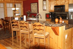 Kitchen counter seats three.