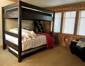 Bunk bed with chair.
