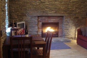 Cottage interior with open fire