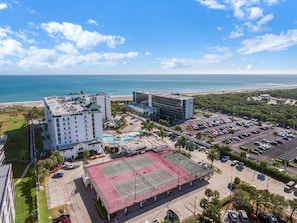 Bird's-eye view overlooking tennis and basketball courts