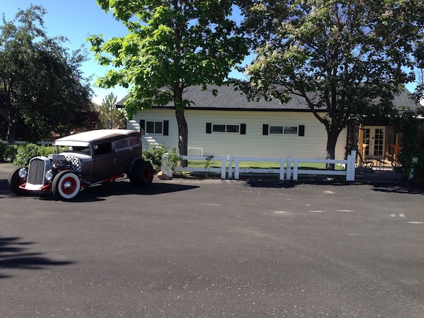 Front of house with large paved parking area!
