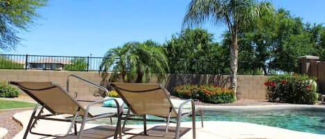 Paradise! Relax by your private pool backing onto a green space.