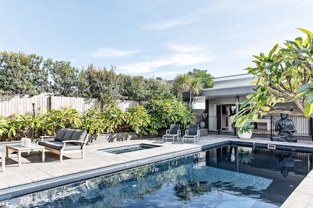The backyard feels like your own private resort.