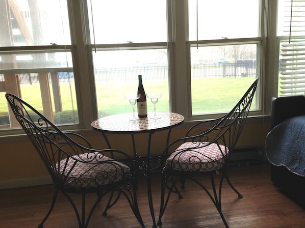 Sunroom table , What a way to watch the lake, the pool and the people!  
